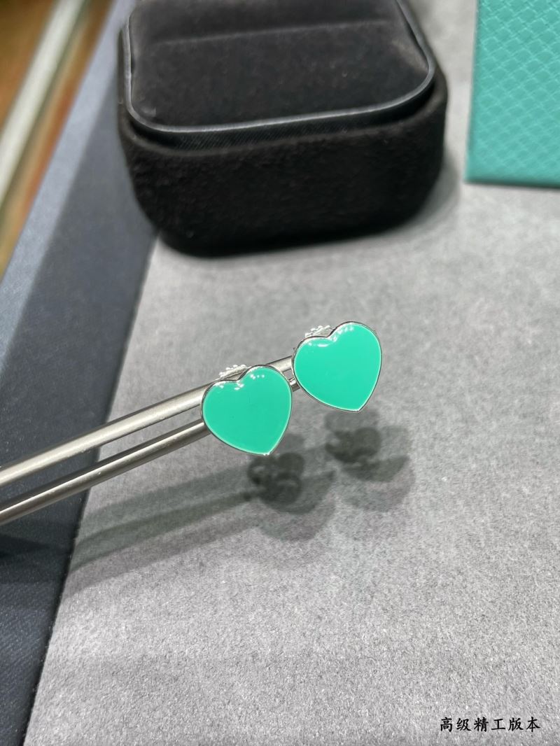 T*f*ny earrings